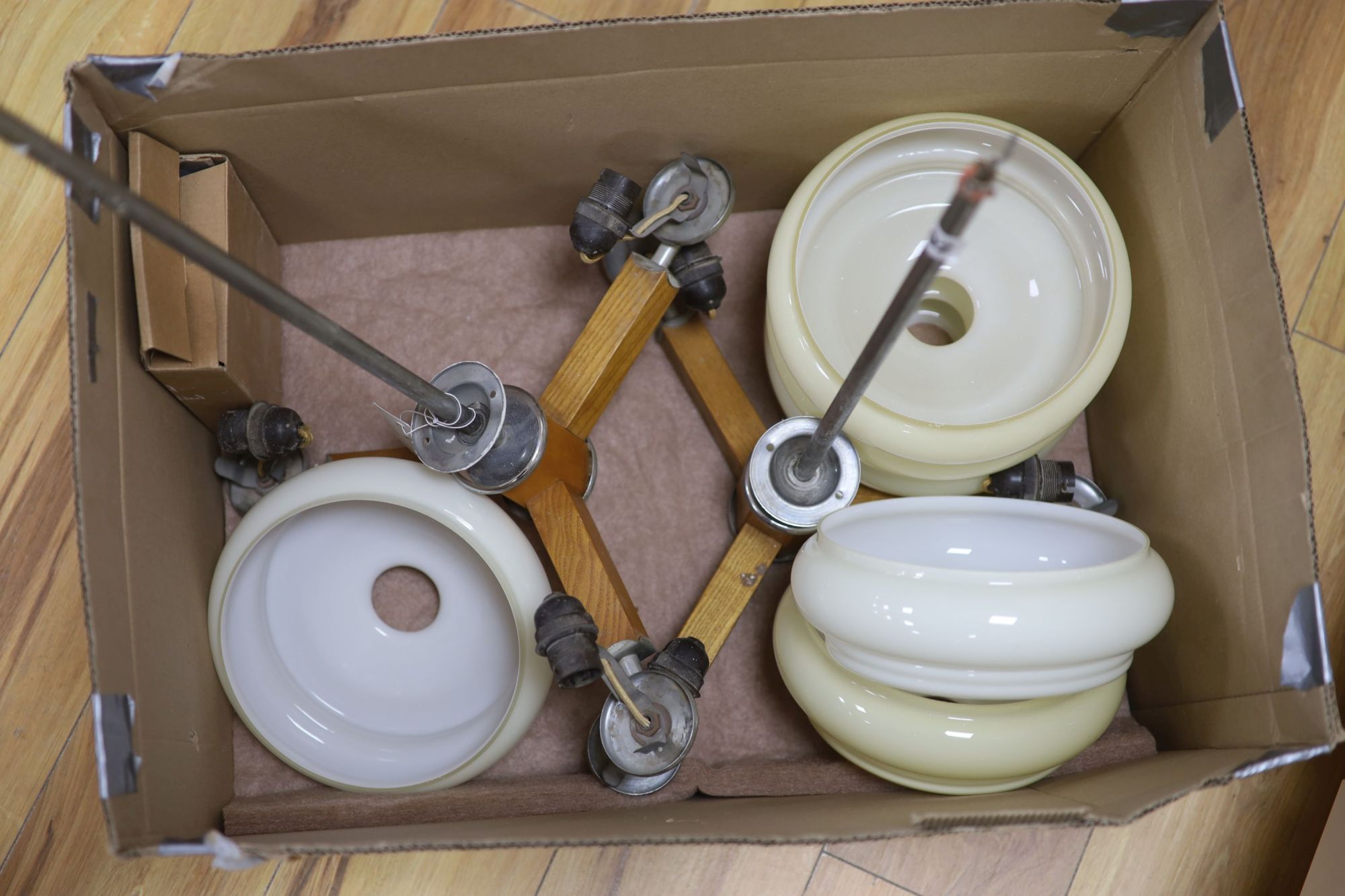 A pair of 1930's chrome yellow glass ceiling lights
